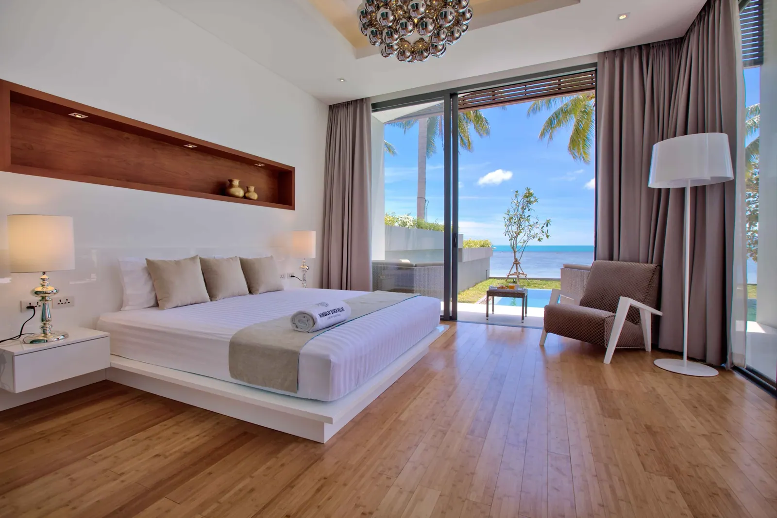 Mandalay Beach Villas — Bedroom and view